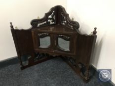 A Victorian mahogany corner wall cabinet