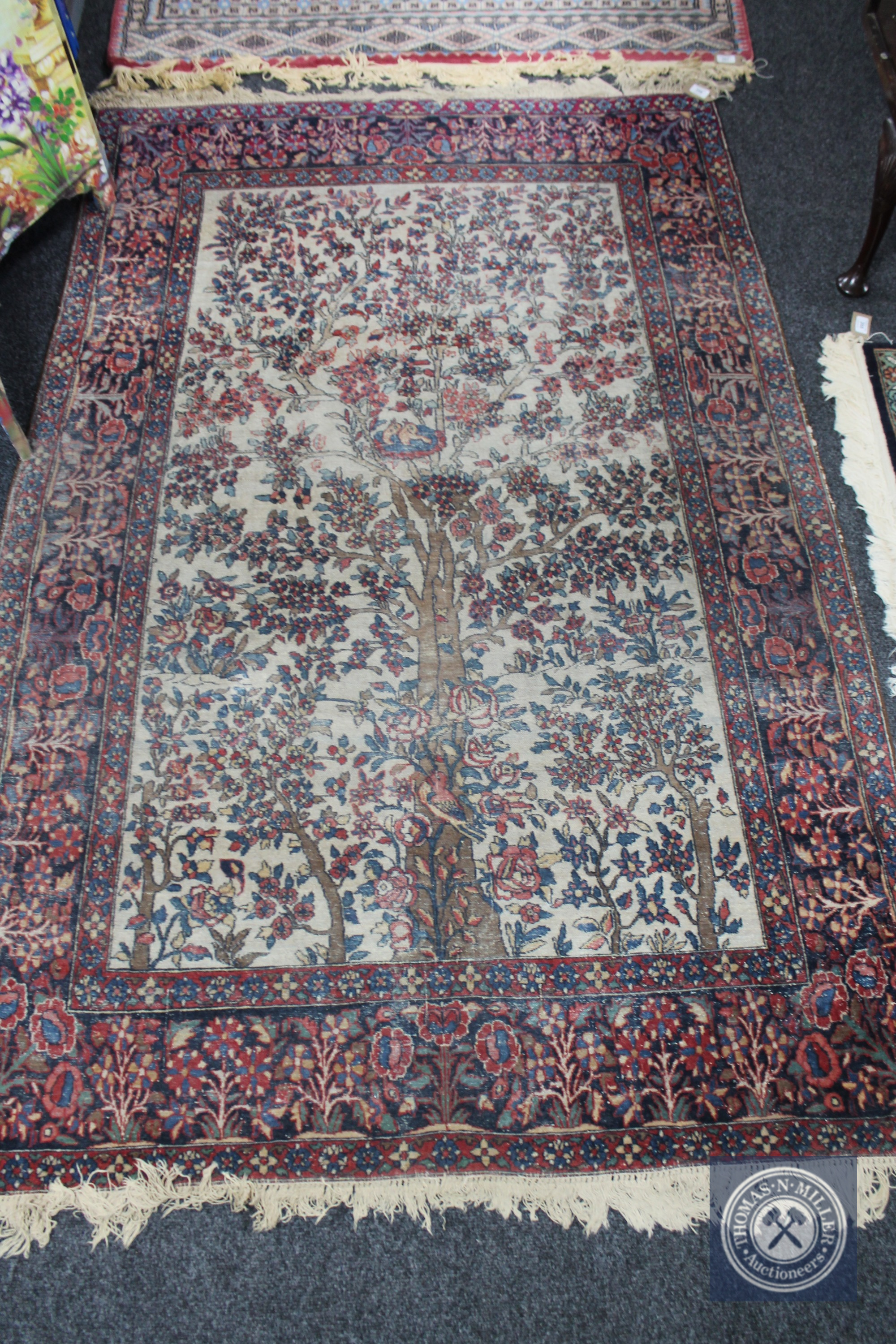 An antique Tabriz Tree of Life rug,