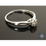 A 9ct white gold solitaire diamond ring,