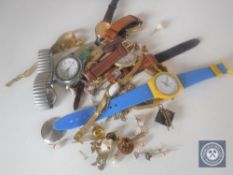 A tub of lady's and gent's wristwatches, costume jewellery, brooches, earrings,