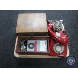 A tray of vintage red telephone, wooden cased neutral earth loop tester,