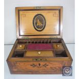 A Victorian inlaid walnut work box CONDITION REPORT: In good condition with no