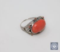 An antique coral ring set in white gold, size O CONDITION REPORT: In good condition.