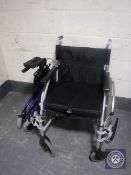 A folding lightweight wheel chair and a folding mobility aid