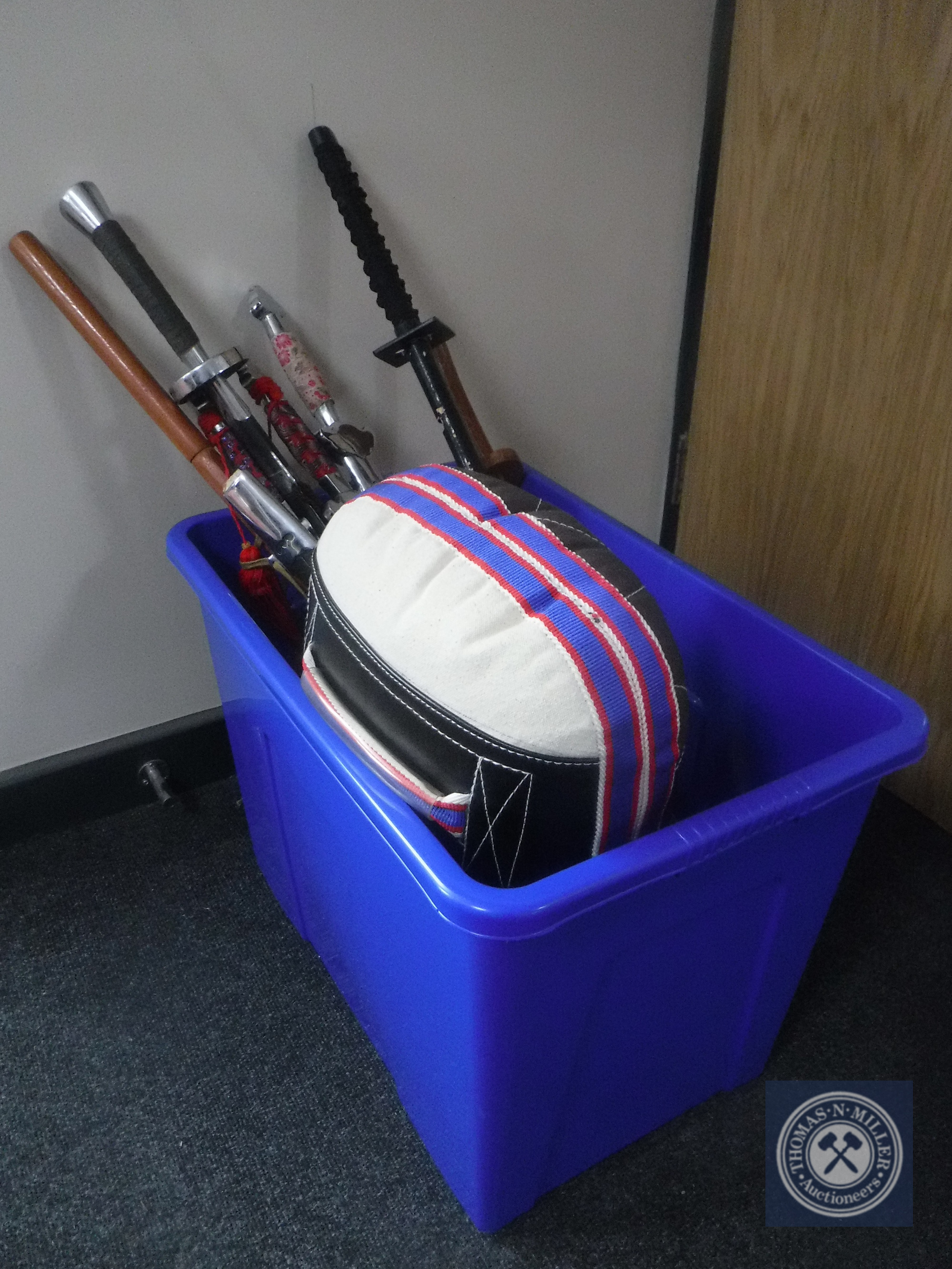 A box of five Japanese style swords together with two wooden swords and practise pad