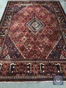 A Joshagan carpet, central Iran, the central stepped,