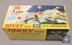 A Dinky Toys model 351 U.F.O Interceptor, with cap-fired rocket, boxed.