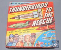 A Peter Pan Playthings Ltd 'Thunderbirds to the Rescue' skill game, boxed.