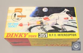 A Dinky Toys model 351 U.F.O Interceptor, with cap-fired rocket, boxed.