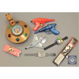 A collection of vintage toys to include - Thunderbird 5, Thunderbird cap and water pistol (2),