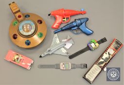 A collection of vintage toys to include - Thunderbird 5, Thunderbird cap and water pistol (2),