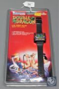 A Tiger From Grandstand - Double Dragon LCD video game watch with alarm, factory sealed.