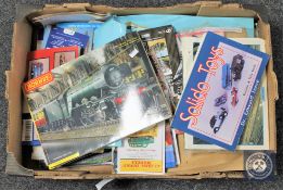 Two large boxes of 00 scale track and long straights together with two further boxes of railwayana.