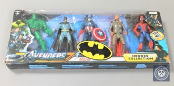 A large number of Batman action figures and accessories including die cast vehicles.