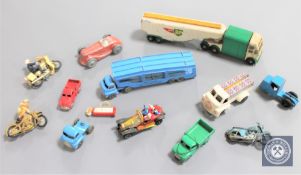 An assortment of mid 20th century die cast vehicles.