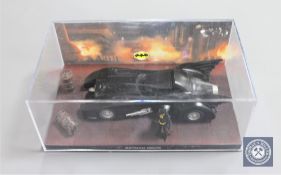 Eighteen cased Eaglemoss Batman vehicles.