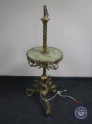 A brass and onyx rise and fall standard lamp/wine table