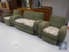 A three piece Art Deco lounge suite in a green floral fabric