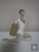 A Lladro figure - Seated gymnast with ball