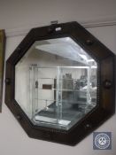 An Edwardian oak framed mirror