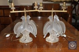 A pair of Lalique Ariane turtle dove crystal lamps with four cream silk shades,