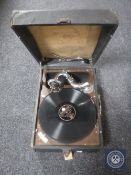 A table topped gramophone together with a small quantity of 78's