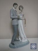 A Lladro figure - Declaration of Love, number 6597 CONDITION REPORT: Height 34cm.