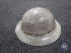 A WWII British tin helmet