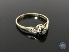 A 9ct gold diamond solitaire ring, size M1/2 CONDITION REPORT: 1.