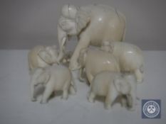 A set of six miniature antique carved ivory elephants