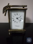 A brass cased Wellington carriage clock with key