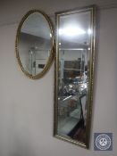 A gilt framed hall mirror and an oval hall mirror