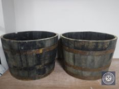 A pair of oak coopered barrel planters
