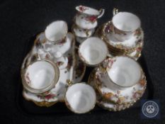 A tray of sixteen pieces of Royal Albert Old Country Roses tea china together with a further