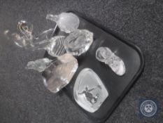 A tray of three cut glass figures together with three cut glass paperweights and a boot