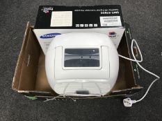 A dehumidifier and a Free Sat recorder