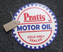 A cast metal plaque "Pratts Motor OIl"
