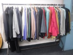 A rail of gent's jackets, coats, blazers, tuxedos and two-piece suits - David Moss,