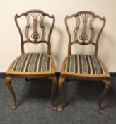 Two pairs of early 20th century mahogany bedroom chairs on cabriole legs