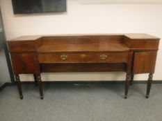 A late George III bow-fronted sideboard,