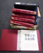 A box of five albums of The Great Britons Collection stamps and two further albums of stamps