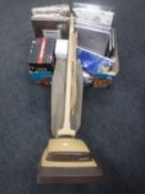 A box of new sealed bedding, vintage Hoover vacuum with hoover bags and accessories,