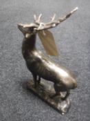 A cast metal figure of a stag