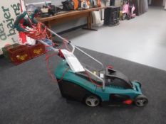A Bosch Rotak Ergoflex electric lawn mower