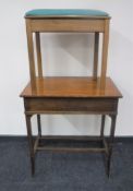 An antique mahogany occasional table together with a storage piano stool