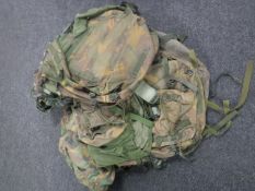 A box of six military ruck sacks