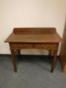 A Victorian oak two drawer side table,