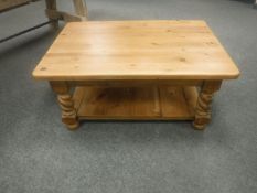 A pine low table with under shelf,