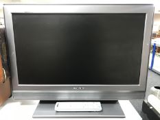 A Sony Bravia 26 inch LCD TV with lead and remote (in perfect working order)