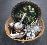 A wicker basket of oriental tray, treen fruit bowl and biscuit barrel,